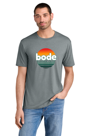 Man wearing the Printify 2026 Bode Summer Bootcamp OG Logo unisex tri-blend t-shirt with a retro sunset graphic, paired with blue jeans, stands against a white background. Features lightweight fabric for all-day comfort.