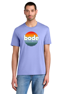 Man wearing a Printify 2026 Bode Summer Bootcamp OG Logo Unisex Tri Blend T-Shirt (DM130) in light purple with sunset graphic and "bode SUMMER CAMP" text on front, paired with blue jeans.