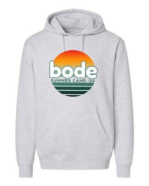 The 2026 Bode Summer Bootcamp OG Logo Hoodie Sweatshirt by Printify features light grey cotton-poly fleece, a green "bode Summer Camp '26" print over an orange-yellow sunset graphic, and an adjustable hood for extra comfort.