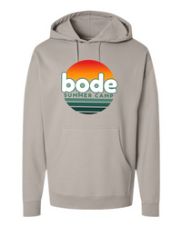 The 2026 Bode Summer Bootcamp — OG Logo Hoodie Sweatshirt by Printify features a beige cotton-poly fleece, adjustable hood, front pocket, and “bode summer camp” logo with an orange, red, and green sunset. Unisex. Independent Trading Co. SS4500.