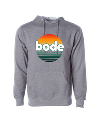 The 2026 Bode Summer Bootcamp OG Logo Hoodie Sweatshirt by Printify features a sunset graphic and "bode SUMMER CAMP ‘26" on gray cotton-poly fleece, with front pocket and adjustable hood. Made with Independent Trading Co. SS4500.