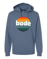 The Printify 2026 Bode Summer Bootcamp OG Logo Hoodie (Unisex SS4500) is a blue cotton-poly fleece sweatshirt with a front pocket, adjustable hood, sunset graphic and "bode SUMMER CAMPS" print—delivering comfort and style all season.