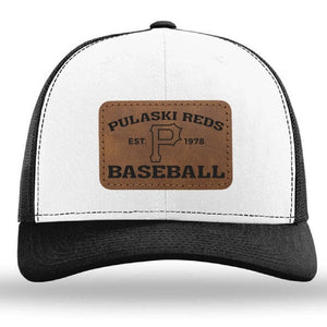 The designerapp Pulaski Reds Baseball Richardson 112 snapback trucker cap features a black and white design with a custom leather patch reading "Pulaski Reds Est. 1978 Baseball" and a bold "P" in the center.