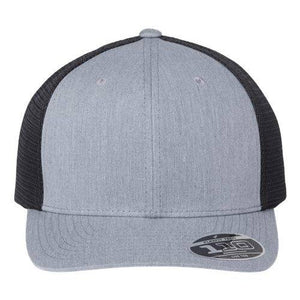 The Flexfit 110 Mesh-Back Trucker Hat with a Permacurv® visor is on a white background.