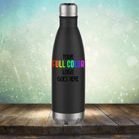 A black insulated water bottle with a customizable area for a full-color logo stands proudly on a wooden surface against a blurred, greenish background, much like our range of Kodiak Coolers' Custom UV Printed Drinkware - Single Side Printing Included in Price designed for style and convenience.