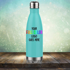 A turquoise insulated water bottle with the text "YOUR FULL COLOR LOGO GOES HERE" sits on a wooden surface, sparkling in the background. It's perfect for showcasing your brand alongside Kodiak Coolers' Custom UV Printed Drinkware - Single Side Printing Included in Price and personalized coffee mugs.