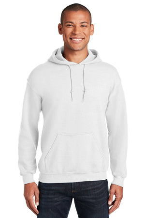 A person smiles at the camera, wearing a Gildan Heavy Blend™ Hooded Sweatshirt with a front pouch pocket and drawstrings; sold as a pack of 36 with custom screen-printed logo included.