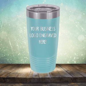 A blue Custom Logo 20 oz Tumbler with the words your business logo engraved here, perfect as a promotional gift or for custom mugs - SPECIAL OFFER - Front side Logo Included by Kodiak Coolers.