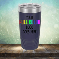 A Custom UV Printed Drinkware - ONE TIME SPECIAL OFFER with a customizable section that reads "Your full color logo goes here," perfect for engraving, placed on a wooden surface with a blurred background by Kodiak Coolers.
