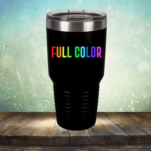A black travel mug, perfect for coffee lovers, with a silver lid sits on a wooden surface. The words "Custom UV Printed Drinkware - ONE TIME SPECIAL OFFER" in rainbow text are displayed on the side, making it stand out among typical coffee tumblers. The background is a soft-focus gradient of blues and greens. This stylish product is from Kodiak Coolers.