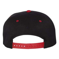 Back view of the Flexfit 110® Flat Bill Snapback Hat, a structured six-panel black cap by Flexfit, featuring a red adjustable strap and matching red ventilation eyelets with a snapback closure.