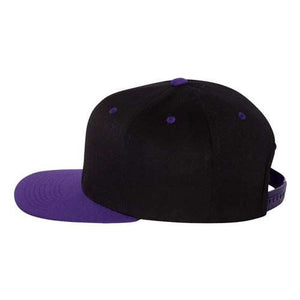 Flexfit 110® Flat Bill Snapback Hat by Flexfit, featuring a black body with a purple brim and a matching top button, viewed from the side. The structured six-panel design enhances durability, while the acrylic/wool/spandex blend guarantees comfort.
