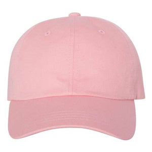 A pink Yupoong Classics 6245CM Classic Dad Hat - Custom Leather Patch Hat in cotton chino twill on a white background.