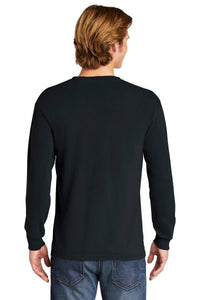 A person with light brown hair faces away, wearing a Comfort Colors Heavyweight Ring Spun Long Sleeve T-Shirt 6014 in black and blue jeans against a plain background.