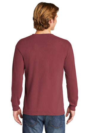 A person with light brown hair is shown from the back, wearing a Comfort Colors Heavyweight Ring Spun Long Sleeve T-Shirt 6014 in maroon and blue jeans against a plain white background.