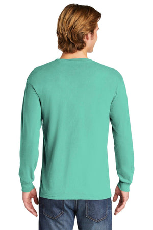 A man with light brown hair, seen from the back, wears a teal Comfort Colors Heavyweight Ring Spun Long Sleeve T-Shirt 6014 and blue jeans.