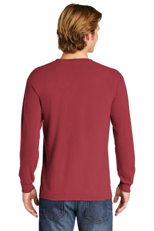 A person with light brown hair, shown from the back, wears a customized Comfort Colors Heavyweight Ring Spun Long Sleeve T-Shirt 6014 in red and blue jeans.