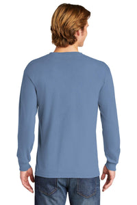 A person with light brown hair is shown from the back wearing jeans and a light blue Comfort Colors Heavyweight Ring Spun Long Sleeve T-Shirt (6014) by Comfort Colors.