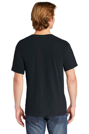 A person with light brown hair is seen from behind, wearing a Comfort Colors Heavyweight Ring Spun Pocket T-Shirt 6030 in black and blue jeans against a white background.