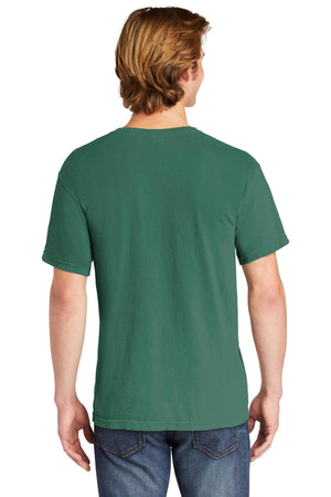 A person with light brown hair is shown from the back wearing a Comfort Colors Heavyweight Ring Spun Pocket T-Shirt 6030 in green and blue jeans.