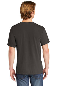 A man with light brown hair is seen from the back, wearing a Comfort Colors Heavyweight Ring Spun Pocket T-Shirt 6030 in dark gray and blue jeans.