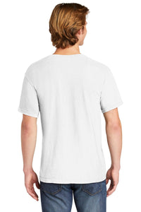 A person with light brown hair stands with their back to the camera, wearing blue jeans and a plain white Comfort Colors Heavyweight Ring Spun Pocket T-Shirt 6030.