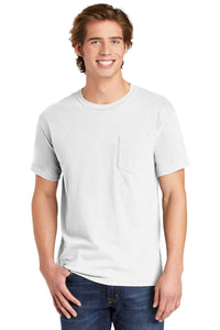A young man smiles while wearing a Comfort Colors Heavyweight Ring Spun Pocket T-Shirt 6030 in plain white, paired with blue jeans, against a white background.