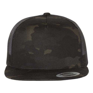 A black trucker hat with a camouflage Multicam pattern, the Yupoong Classics 5089M Five-Panel Classic Trucker Cap by YP Classics.