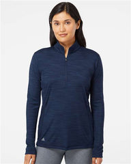 A woman wearing a Lightweight Melange Quarter-Zip Pullover by Adidas.