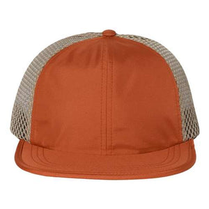 The orange and beige Richardson trucker hat features performance mesh for added breathability.
