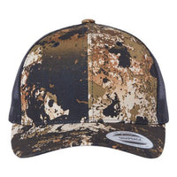 The YP Classics Yupoong Classics Six-Panel Retro Trucker Snapback Hat 6606 - Custom Embroidered Hat boasts a mesh back for breathability and showcases a mottled brown, black, and white pattern on the front.