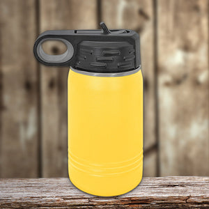 Yellow insulated stainless steel water bottle with a black flip-top lid on a wooden surface by Kodiak Coolers.