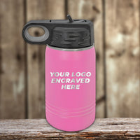 Kodiak Coolers Custom Kids Water Bottles 12 oz, personalized with your logo, name, or design. Features a pink insulated stainless steel body, black lid with loop handle, set on a wooden background. Special Black Friday Sale—LIMITED TIME!.