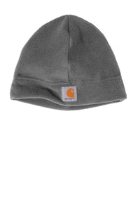 The Carhartt Fleece Hat (CTA207) is a gray polyester beanie with a Carhartt label patch on the front, designed to provide extra warmth.