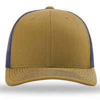 The Richardson 112 Snapback Trucker Cap by Richardson is a brown and navy blue custom embroidered hat with a curved brim, cotton/polyester front, and mesh back, shown from the front.
