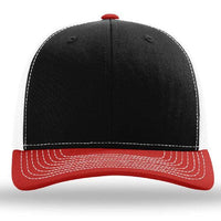 The Richardson 112 Snapback Trucker Cap by Richardson features a black front, white side panels, red bill, white stitching, and a breathable mesh back. Custom embroidery available.