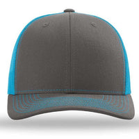 The Richardson 112 Snapback Trucker Cap by Richardson features a gray front, blue mesh back, blue-stitched bill, and a cotton/polyester blend. Shown from the front with custom embroidery.