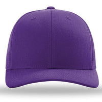 The Richardson 112 Snapback Trucker Cap by Richardson is shown from the front in plain purple, featuring a curved brim, structured crown, and breathable mesh back.