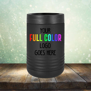 A black Custom UV Printed Drinkware - Single Side Printing Included in Price by Kodiak Coolers with customizable text reading "Your Full Color Logo Goes Here" sits on a wooden surface with a blurred sparkly background, perfect alongside personalized coffee mugs for your complete branded collection.