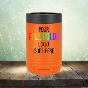 An orange insulated tumbler on a wooden surface against a blurred green background. The Custom UV Printed Drinkware - ONE TIME SPECIAL OFFER from Kodiak Coolers displays the text "YOUR FULL COLOR LOGO GOES HERE," ideal for custom engraving.