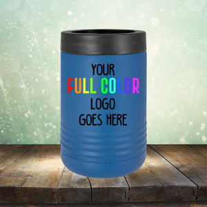 A blue can cooler with a black rim displayed on a wooden surface. The text on it says, "Custom UV Printed Drinkware - ONE TIME SPECIAL OFFER." The background is light with sparkling bokeh effects, making it perfect for showcasing alongside customized tumblers and coffee mugs by Kodiak Coolers.