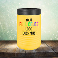 A yellow insulated tumbler with a black lid sits on a wooden surface, displaying the text "Your Full Color Logo Goes Here" in vibrant hues. Ideal for engraving, the background features a light gradient with a bokeh effect, making this Custom UV Printed Drinkware - ONE TIME SPECIAL OFFER from Kodiak Coolers perfect coffee mugs for branding.