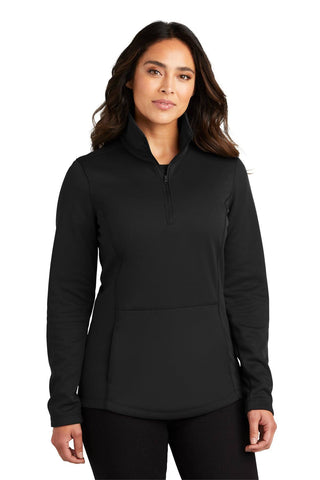 A woman models the Port Authority Ladies Smooth Fleece 1/4-Zip Pullover L804, showcasing its high collar and front pocket, against a plain white background.