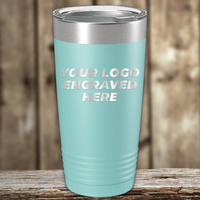 A teal Kodiak Coolers tumbler with your custom company logo engraved, shown on a wooden surface—ideal as a personalized Realtor closing gift or unique promotional drinkware for clients.