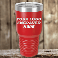 A red Kodiak Coolers SAMPLE 30 oz Tumbler with a clear lid rests on a wooden surface. "YOUR LOGO ENGRAVED HERE" appears on the front, ideal for personalized or promotional drinkware. Price includes engraved logo sample and setup fee.