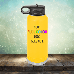 Yellow Custom UV Printed Drinkware - Single Side Printing Included in Price from Kodiak Coolers with a screw cap lid and text "Your Full Color Logo Goes Here" displayed on a wooden surface with a blurry background, perfect for pairing with customized tumblers or personalized coffee mugs for a cohesive branded set.