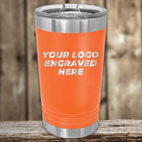 The Kodiak Coolers Realtor Closing Gifts for Clients tumbler features your custom company logo engraved in white on orange drinkware with a clear lid, ideal for promotional gifts or custom logo mugs.