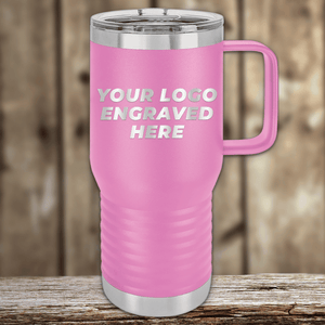 A pink travel mug by Kodiak Coolers, featuring stainless steel accents and your custom company logo engraved on the front, sits on a wooden surface—an ideal Realtor closing gift for clients and a standout promotional item.