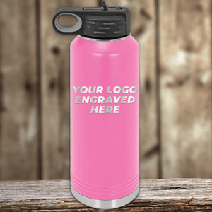 A pink metal water bottle from Kodiak Coolers with a black lid and your custom company logo engraved is the perfect Realtor closing gift for clients, making memorable promotional drinkware for your brand.