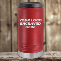 Red insulated tumbler with black lid and silver base, featuring "Your Custom Company Logo Engraved" by Kodiak Coolers—Realtor Closing Gifts for Clients—displayed on a wooden surface with a wood panel background.
